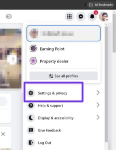 In the dropdown menu, locate and click on the "Settings & Privacy" option. 